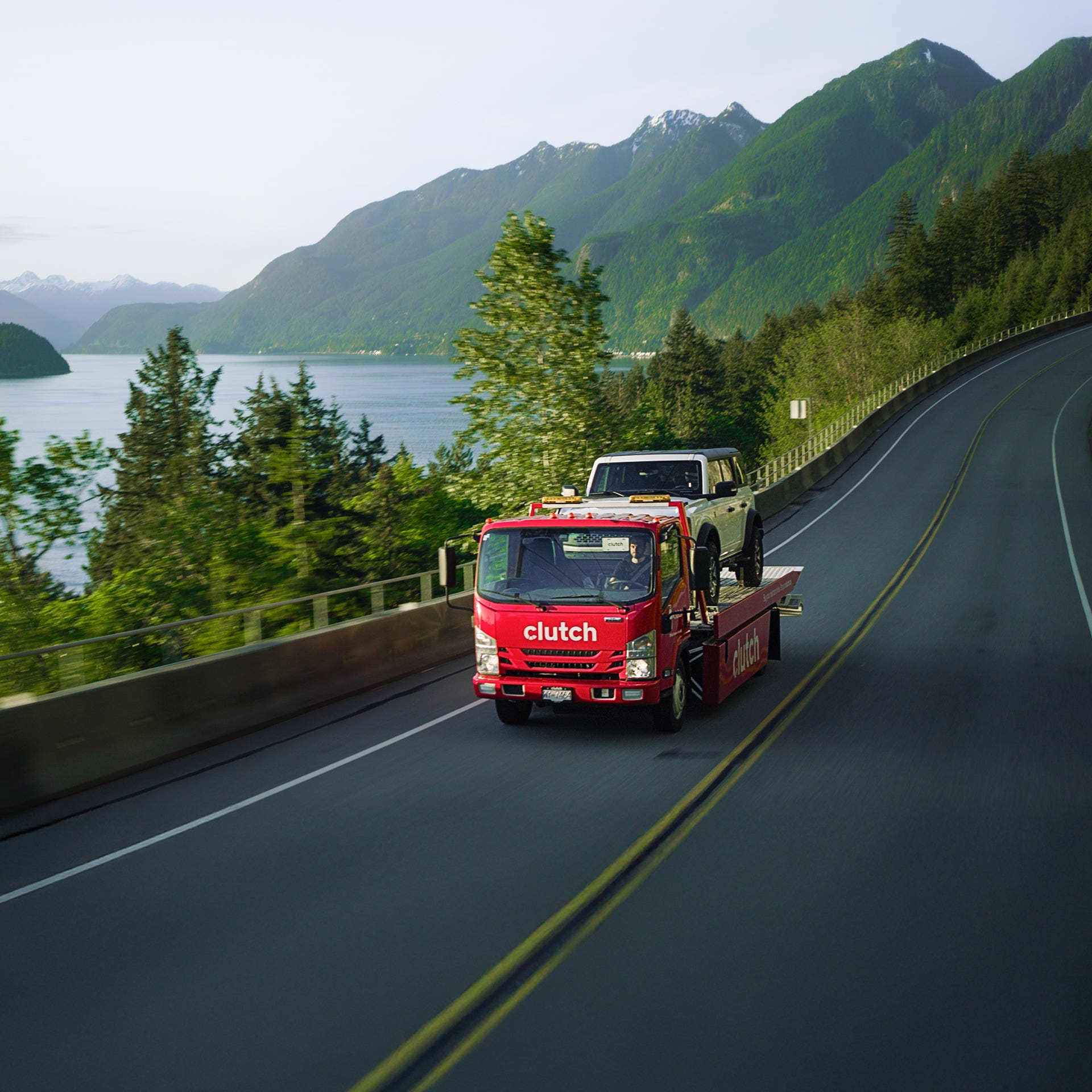 Aerial drone view of a truck on a British Columbia road