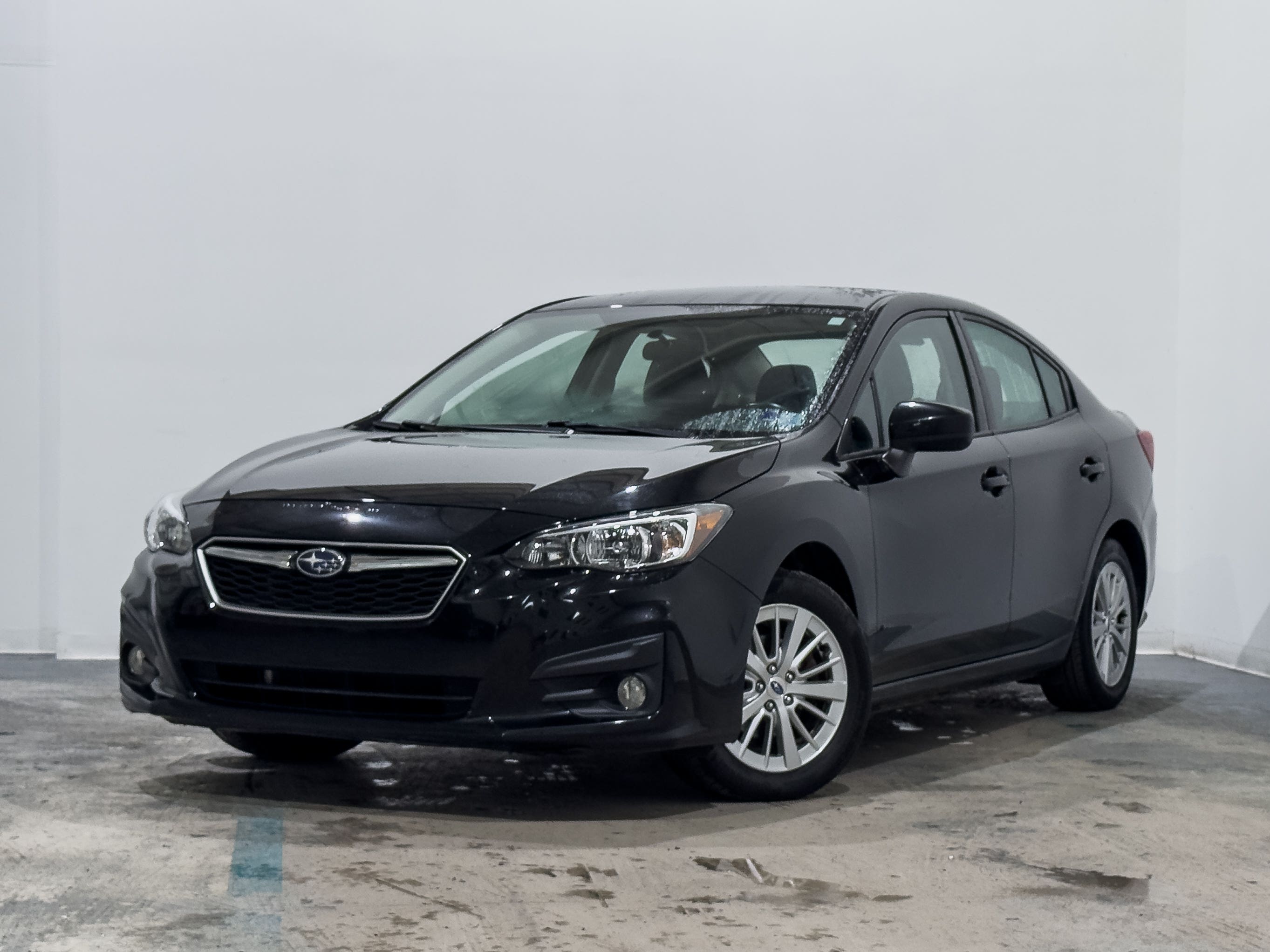 Black 2017 Subaru Impreza Sedan  Automatic
